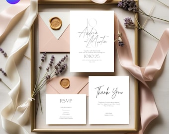 May include: A framed wedding invitation suite featuring a main invitation, RSVP card, and thank you card. The main invitation reads "Andrea and Martin" with the date "10.10.25". Envelopes with wax seals and lavender sprigs are also included.