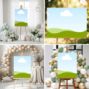 May include: Four images of wooden easels displaying artwork with a blue sky, white cloud, and green landscape design. The easels are surrounded by decorative elements like balloons and flowers, suggesting a celebratory theme.