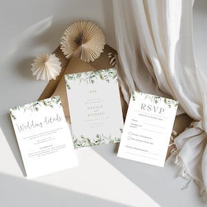 May include: Wedding stationery set with botanical illustrations. The set includes an invitation, RSVP card, and details card. The invitation features the names "Natalie & Richard". The RSVP card has fields for guest names and dietary requirements.