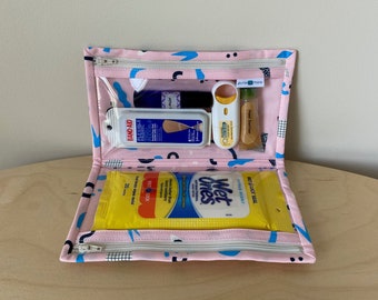 Anagram shapes first aid organizer with two clear zipper pouches, baby shower gift for new parents, fold over makeup bag