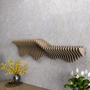 May include: A wooden wall-mounted shelf with a unique, wavy design. The shelf is made of multiple thin pieces of wood that are stacked and curved to create a flowing, organic shape.