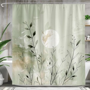 Puede incluir: Una cortina de ducha verde con un círculo blanco y siluetas negras de plantas y hojas.