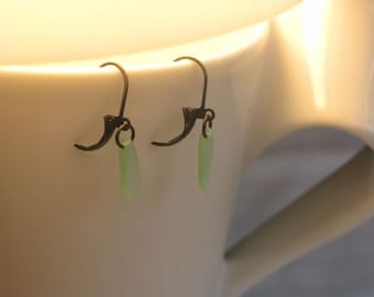 Frosted Light Green Glass Dagger Earring on leverback earwires.