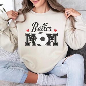 Sudadera Baller Soccer Mom: ropa acogedora para el día del partido