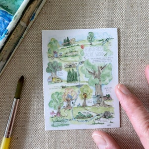 May include: A watercolor illustration of a map of Hundred Acre Wood from Winnie the Pooh. The map shows the locations of various characters' homes, including Piglet's House, Owl's House, Christopher Robin's House, and Floppy Place. The map also includes a winding path and a stream.