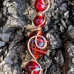 Red and copper cigarette holder ring