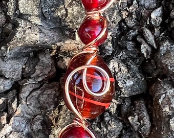 Red and copper cigarette holder ring