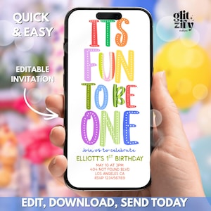 May include: A smartphone screen shows a vibrant birthday invitation. The design features the words "ITS FUN TO BE ONE" in various colours. The invitation provides details for Elliott's 1st birthday, including date, time, and location. Additional text reads "Quick & Easy, Editable Invitation, Edit, Download, Send Today."