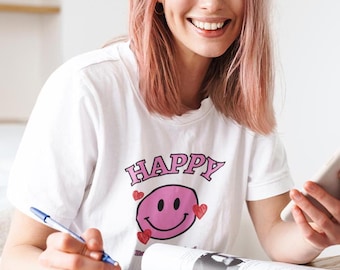Camiseta rosa con cara sonriente: vibras felices, camiseta positiva