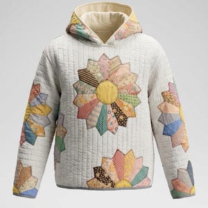 May include: A long-sleeve hooded sweatshirt made of off-white quilted fabric. The garment features multiple appliquéd flower motifs in various pastel and earth-toned patterned fabrics, including stripes, dots, and floral prints, with a yellow center.