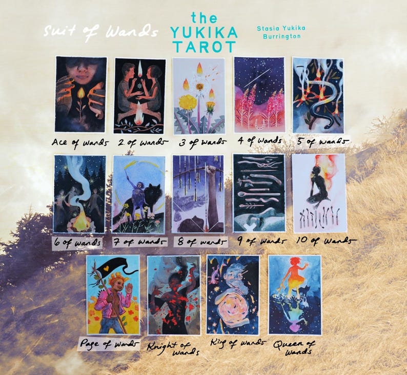 May include: A collection of fourteen tarot cards from the Suit of Wands in the Yukika Tarot deck by Stasia Yukika Burrington. Each card features unique, colorful illustrations depicting various scenes, figures, and symbols related to the suit of wands.