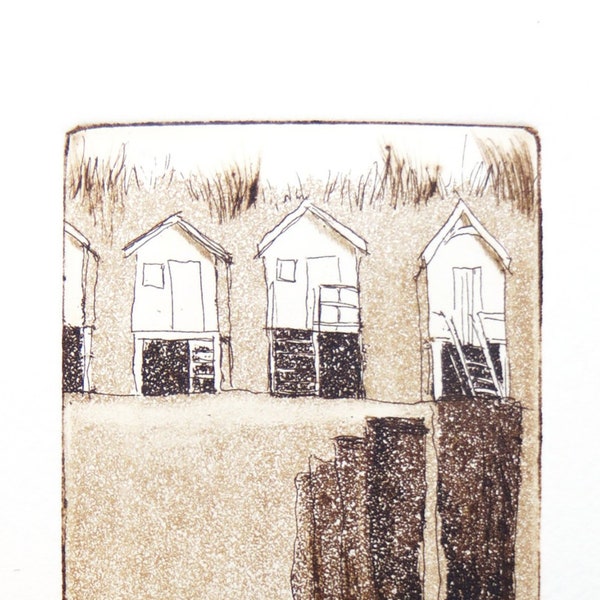 original etching and aquatint of a beach huts and wave breakers