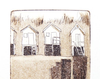 original etching and aquatint of a beach huts and wave breakers