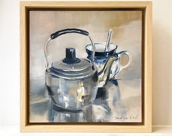 framed oil painting on panel of a teapot and cup