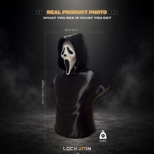 May include: A black hooded bust featuring a white ghost-like mask with hollow eyes and an elongated mouth. The figure measures 6.3 inches in width and 12.2 inches in height, with a weight of 520 grams. Text includes REAL PRODUCT PHOTO and LOCK3DIN.