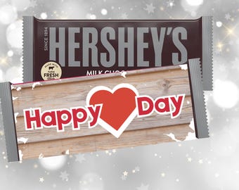 May include: A Hershey's chocolate bar with a custom wrapper that says "Happy Day" with a red heart. The wrapper is a wood grain design.