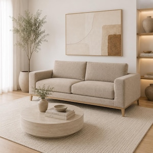 Moderne bisque bank met eikenhouten onderstel, luxe minimalistische woonkamerbank