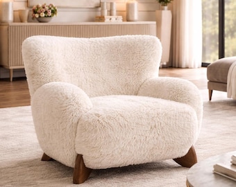 Sillón moderno de bouclé, cómodo asiento tipo lounge con base de madera, mueble escultural para sala de estar.