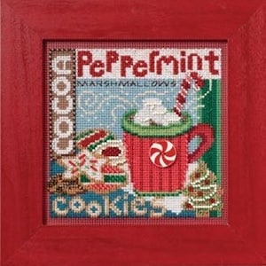 May include: A cross-stitch pattern featuring a red mug with a peppermint candy, marshmallows, and the text "Peppermint Marshmallows Cookies".