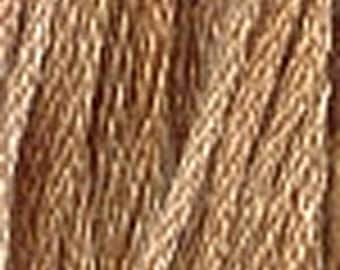 May include: A close-up of a bundle of natural brown twine. The twine is made of tightly woven fibers and has a rustic look.