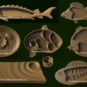 May include: A collection of brown, fish-shaped serving dishes and decorative items. The items include a large sturgeon-shaped tray, a round dish with koi fish, and several other fish-themed designs. The text "FirstWonderStore" is visible on each item.