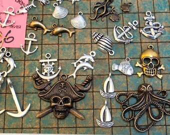 25 nautical charms, pirate, anchors, octopus, ships, dolphin, fish, skull crossbones,kraken, clam shell, diecast metal