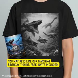 May include: Black t-shirt featuring a grayscale underwater scene with various prehistoric marine reptiles. The design includes a large mosasaur with an open mouth, plesiosaurs, and other marine creatures. A matching birthday invitation is also shown. The text on the invitation reads "MAXIMILLIAN IS TURNING 9".