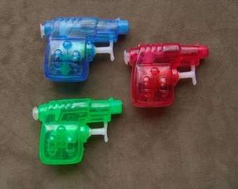 space squirt guns