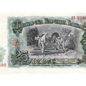 May include: A Bulgarian 25 Leva banknote featuring a grayscale illustration of workers in a tunnel. The note has a light blue and green border with floral designs and the text "БЪЛГАРСКА НАРОДНА БАНКА". Serial number BE 926590.