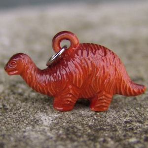 1964 NY Worlds Fair Sinclair Gas Detailed Orange Brachiosaurus Dinosaur Pendant Toy
