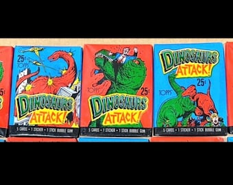 Three Unopened Packs of 1988 DINOSAURS ATTACK pop culture icon Cards
