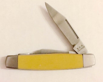 Authentic 1960s Collectors Yellow BMW Solingen Stockman Pocket Knife