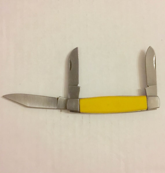 Authentic 1960s Collectors Yellow BMW Solingen Stockman Pocket
