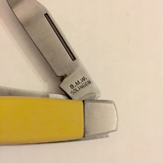 Authentic 1960s Collectors Yellow BMW Solingen Stockman Pocket