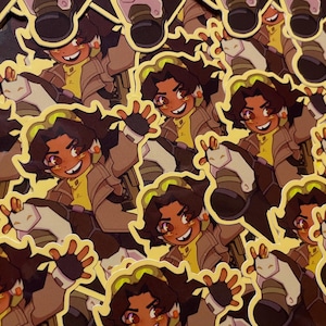 Puede incluir: Una colección de pegatinas con un personaje de dibujos animados con cabello castaño, una camisa amarilla y una chaqueta marrón. El personaje sonríe y saluda, con una pequeña criatura blanca. Las pegatinas tienen un borde amarillo.