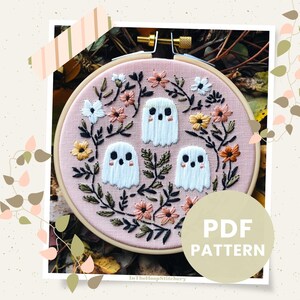 May include: A pink embroidery hoop with a floral design and three white ghosts. The text "PDF PATTERN" is on a beige circle in the lower right corner of the image.