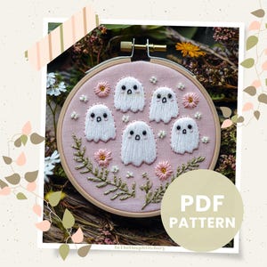 May include: A pink embroidery hoop with a design of five white ghosts and pink flowers. The text "PDF PATTERN" is in the lower right corner of the image.