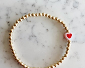 White & red heart bracelet