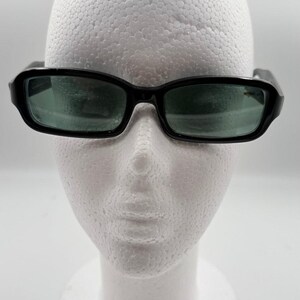 Sergio Tacchini Black Oval Women\'s Sunglasses with Green Case Sergio Tacchini Eyeglass Frames for sale - eBay main image 4