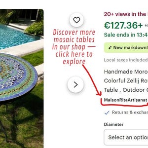 May include: A round table featuring a colorful mosaic tile top with a geometric pattern in shades of blue, green, and yellow. The table is supported by a black metal frame with four thin, curved legs that meet at a central point near the base.