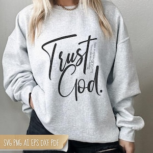 May include: A gray sweatshirt with the text "Trust God. There was no way, but GOD made a way." printed on the front.