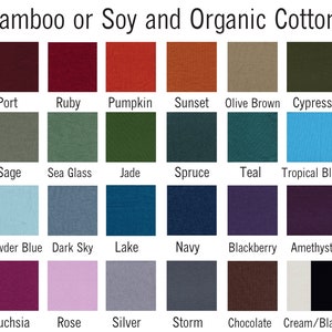 Puede incluir: Una carta de colores que muestra 20 colores de tela diferentes, incluyendo Port, Ruby, Pumpkin, Sunset, Olive Brown, Cypress, Sage, Sea Glass, Jade, Spruce, Teal, Tropical Blue, Powder Blue, Dark Sky, Lake, Navy, Blackberry, Amethyst, Fuchsia, Rose, Silver, Storm, Chocolate y Cream/Black. La tela está hecha de bambú, soya y algodón orgánico.