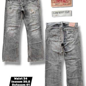 Vintage Levi's 527 Low Boot Cut jeans uit het jaar 2000 | Vervaagde grijze distressed grunge denim (taille 86 cm)