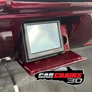Upgrade your 1973 to 1987 C10 and K10 with the perfect solution for mounting your Holley 3.5" screen. Designed by Square Root Fabrication and offered through CarChains3d, this ashtray mount provides a seamless integration for LS swapped trucks, placi