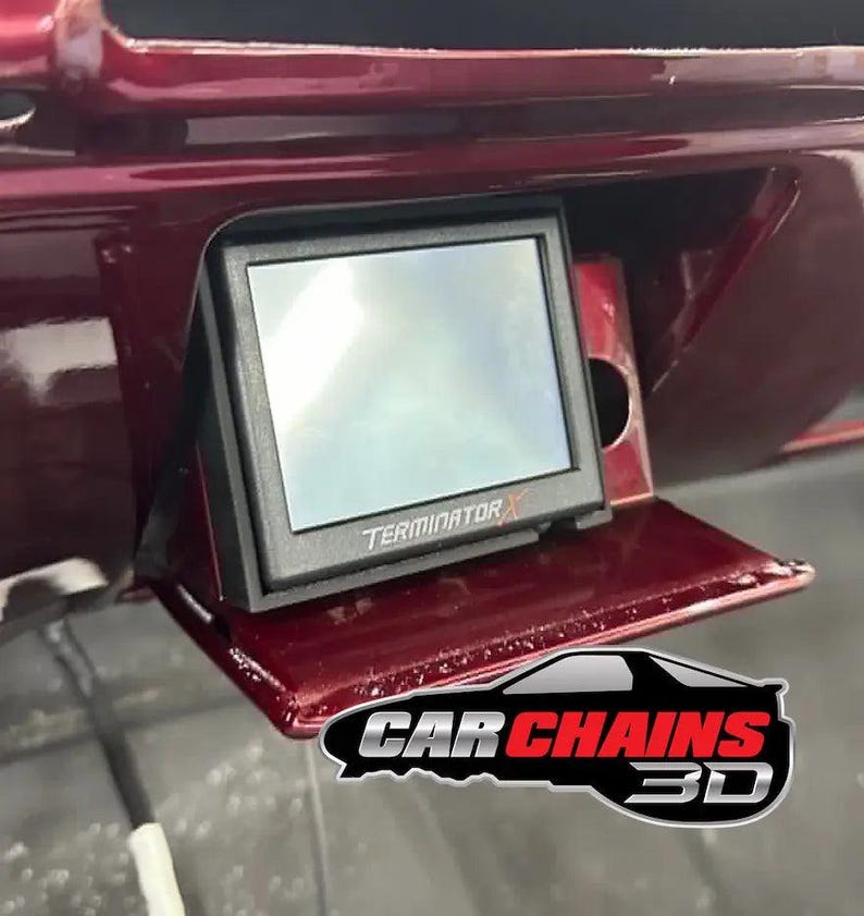 Upgrade your 1973 to 1987 C10 and K10 with the perfect solution for mounting your Holley 3.5" screen. Designed by Square Root Fabrication and offered through CarChains3d, this ashtray mount provides a seamless integration for LS swapped trucks, placi