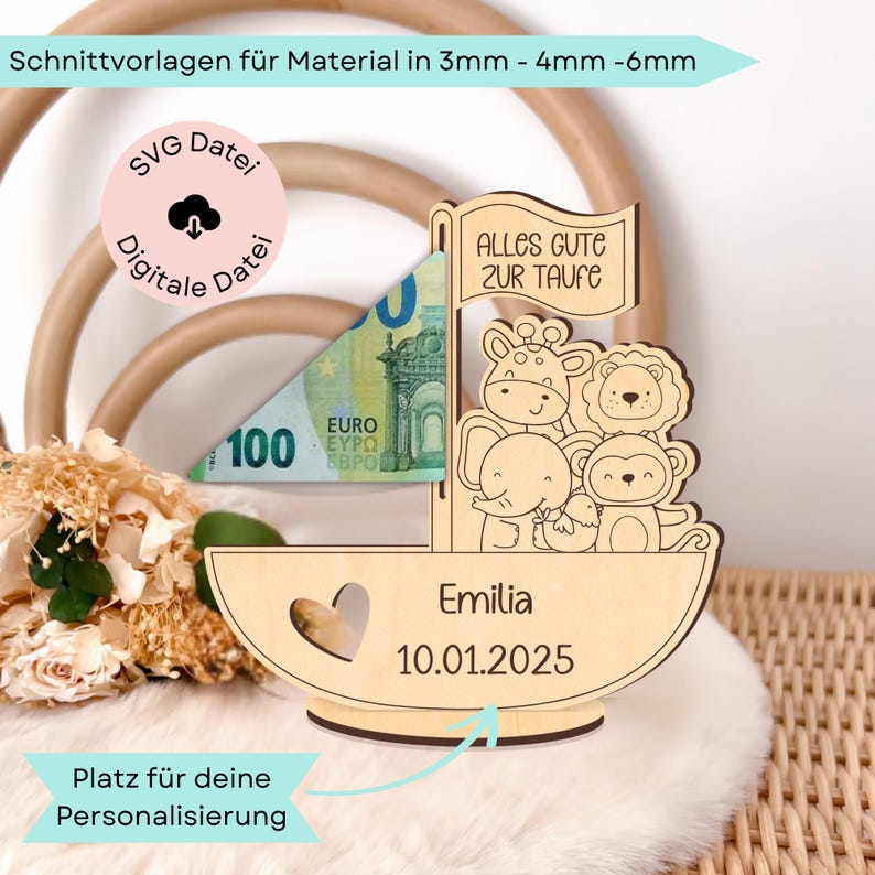 May include: Wooden cutout of a sailboat with a heart, animals, and the text "Alles Gute zur Taufe" (German for "All the best for the baptism"). The sailboat has a slot for money and is personalised with the name "Emilia" and the date "10.01.2025".
