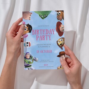 May include: A blue and pink birthday party invitation with a cartoon image of characters from the Toy Story movie franchise. The invitation says "You're invited to Birthday Party Olivia Wilson is turning 6 19 October Start at 12:00 123 Anywhere St, Any City RSVP"