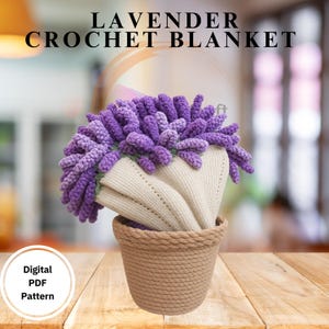 May include: A crochet lavender blanket in a woven basket. The blanket is beige with purple lavender blooms. The basket is a light brown color. The text "LAVENDER CROCHET BLANKET" is at the top of the image. The text "Digital PDF Pattern" is in a white circle.