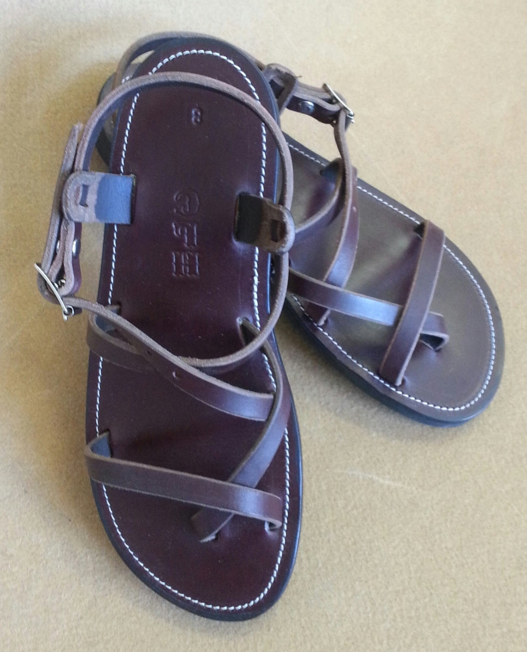 famous footwear genie sandal