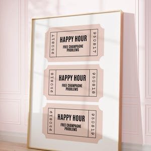 May include: Three pink ticket-shaped prints with gold trim, each with the text "HAPPY HOUR FREE CHAMPAGNE PROBLEMS" in black.